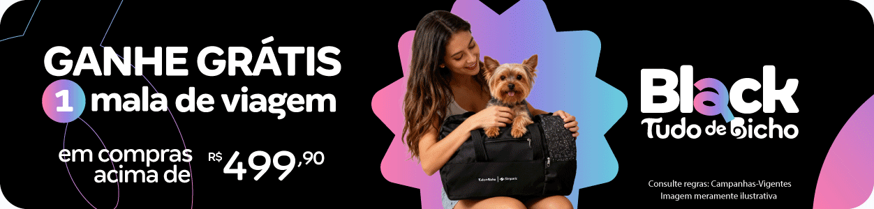 Mala de viagem Tudo de Bicho no colo de uma tutora com seu Yorkshire